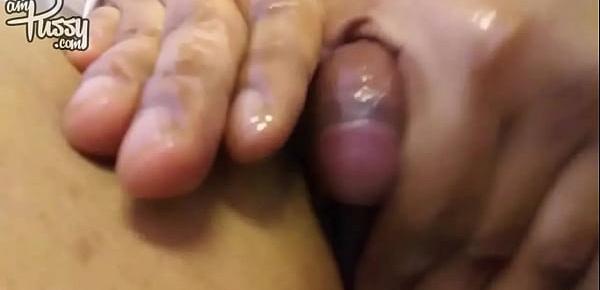  Ebony girl is rubbing her large clitoris